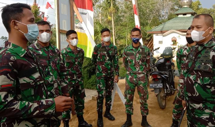 Pasukan  Yonif 125  / Simbisa Membantu Pelaksanaan   TMMD ke 111 Kodim 0212 /TS