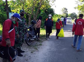 Kopda Andri Melaksanakan Jum’at Bersih Bersama Warga