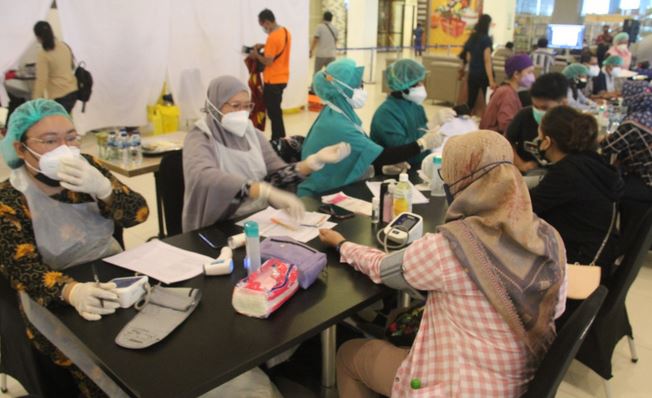Antusias Warga Kotim Polda Kalteng, Sambut Vaksinasi Massal